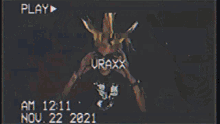 a video of a group of people with uraxx written in white letters