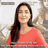 a woman is standing in front of a movie poster with her eyes closed and talking .