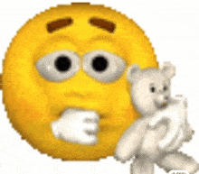 a yellow smiley face is holding a teddy bear in front of it