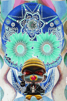 a cartoon character with a pacifier in his mouth is standing in front of a blue skull with flowers on it