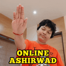 a person 's hand is raised in front of a sign that says " online ashirwad "