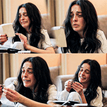 a woman is sitting on a couch holding a piece of paper and making different faces
