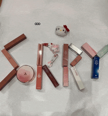 a bunch of lipsticks are arranged in the shape of the letters skk