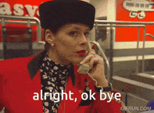 a woman talking on a phone with the words " alright ok bye " on the bottom