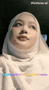 a woman wearing a white hijab with pixverse.ai on the bottom
