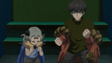 a boy and a girl are standing next to each other