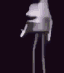 a cartoon character with long legs and a mouth is in a pink box .
