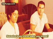 natasha loves these bags you know written on a picture