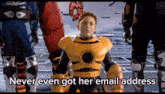 a boy in a robot costume says " never even got her email address " in front of a group of robots