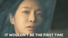 a close up of a woman 's face with the words " it wouldn 't be the first time " above her