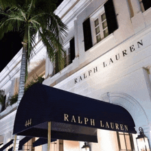 a ralph lauren store with a blue awning
