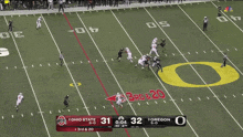 a football game between ohio state and oregon is going on