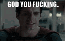 a close up of a man 's face with the words `` god you fucking '' written above him .