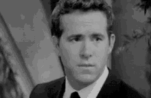 Ryan Reynolds GIF - Ryan Reynolds Smirk Stare GIFs