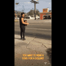 a man playing a guitar on a sidewalk with the words you want to hear a song for a dollar below him