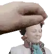 a hand is holding a woman 's head in a pixel art .