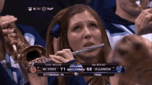 villanova flute player meme