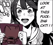 a black and white cartoon of a girl holding a piece of paper with a cat drawing on it .