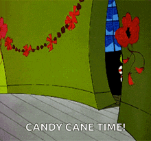 The Grinch Candy Cane GIF - The Grinch Candy Cane Candy Canes GIFs