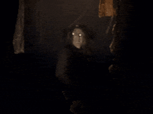 a dark background with a light coming out of it