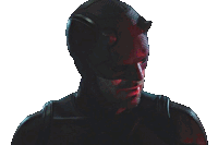 a man in a daredevil costume looks down at something