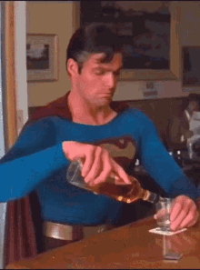 superman drinking christopher reeve whiskey johnnie walker