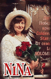 a woman holding a bouquet of red roses with the name nina on the bottom right