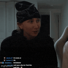 a man wearing a beanie is smiling in front of a screen that says imgflip.com in the corner