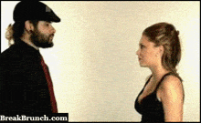 a man and a woman are looking at each other and the website breakbrunch.com is visible