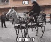 a man is riding on the back of a horse drawn carriage on a street .