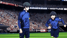 two soccer players are running on a field in front of a banner that says bluelock