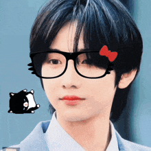 a close up of a person wearing glasses with a bow on them
