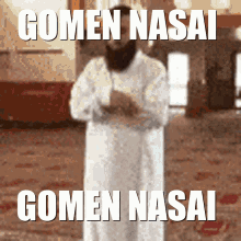 a blurred image of a man praying with the words gomen nasai