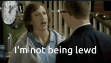 a man and a woman are having a conversation and the woman says i 'm not being lewd .
