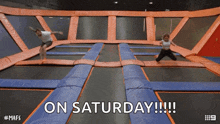 two people are jumping on a trampoline with the words on saturday !!!