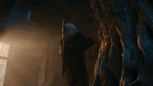 Hanging A Necklace Vesemir GIF - Hanging A Necklace Vesemir The Witcher GIFs
