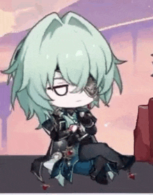 a chibi anime character with green hair and glasses is sitting on the floor .