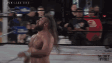 a man in a glory pro wrestling ring holds a rope