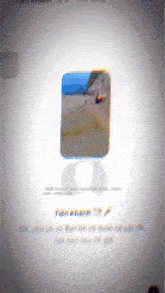 a phone screen shows a picture of a beach and says tien khanh