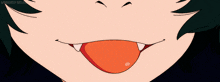 a close up of a person 's mouth with their tongue out