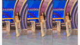 a woman in a white dress is standing in front of a sign that says alegria