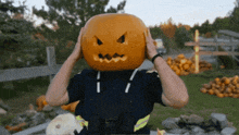 a man with a pumpkin carved on his head
