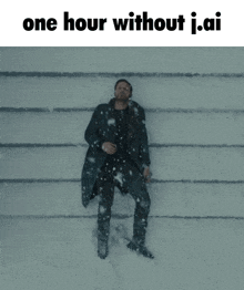 a man is laying in the snow with the words one hour without i.ai above him