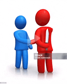 two people shaking hands with one holding a knife behind his back