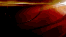 a close up of a light beam on a red background