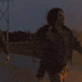 a man wearing a lanyard with a badge that says ' a.b. ' on it