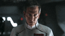 a man says " i will not fail " in front of a dark background