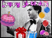 a man in a tuxedo is holding a cake that says happy birthday on it