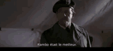 a man in a suit is talking in french