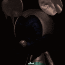 a computer generated image of a mickey mouse with the words " what " below it